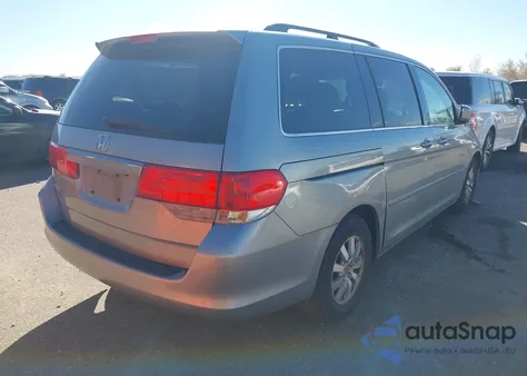 2010 Honda Odyssey Ex-L z USA, uszkodzony, nr VIN 5FNRL3H66AB102575